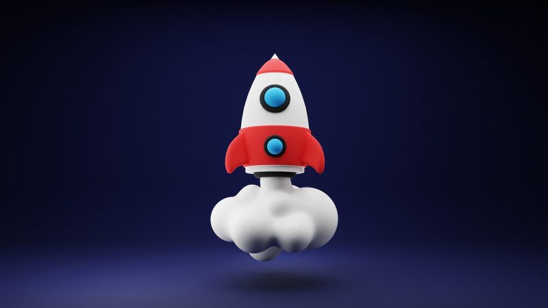 Representación 3D de un cohete espacial utilizado para adornar un poste que describe el lanzamiento de un grupo para usuarios y usuarias de FileMaker en Chile.